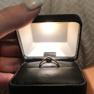 Silver ring in a light up box